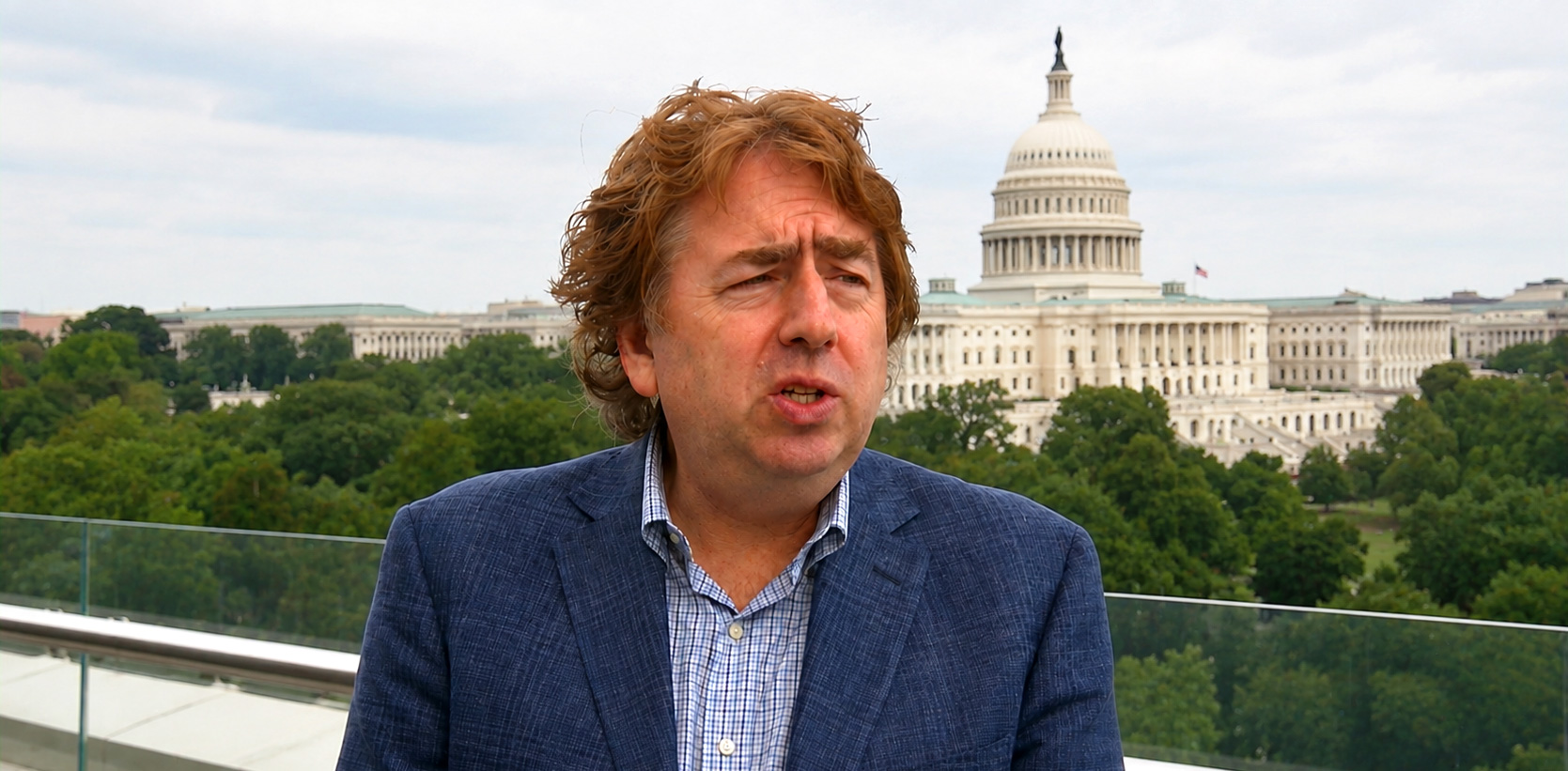 Director Joel Gilbert in front of the United States Capitol